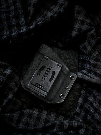 Detailed rear view of the Black-Grey phone case for iPhone 17 Pro and iPhone 17 Pro Max, highlighting the black belt clip and mounting hardware.