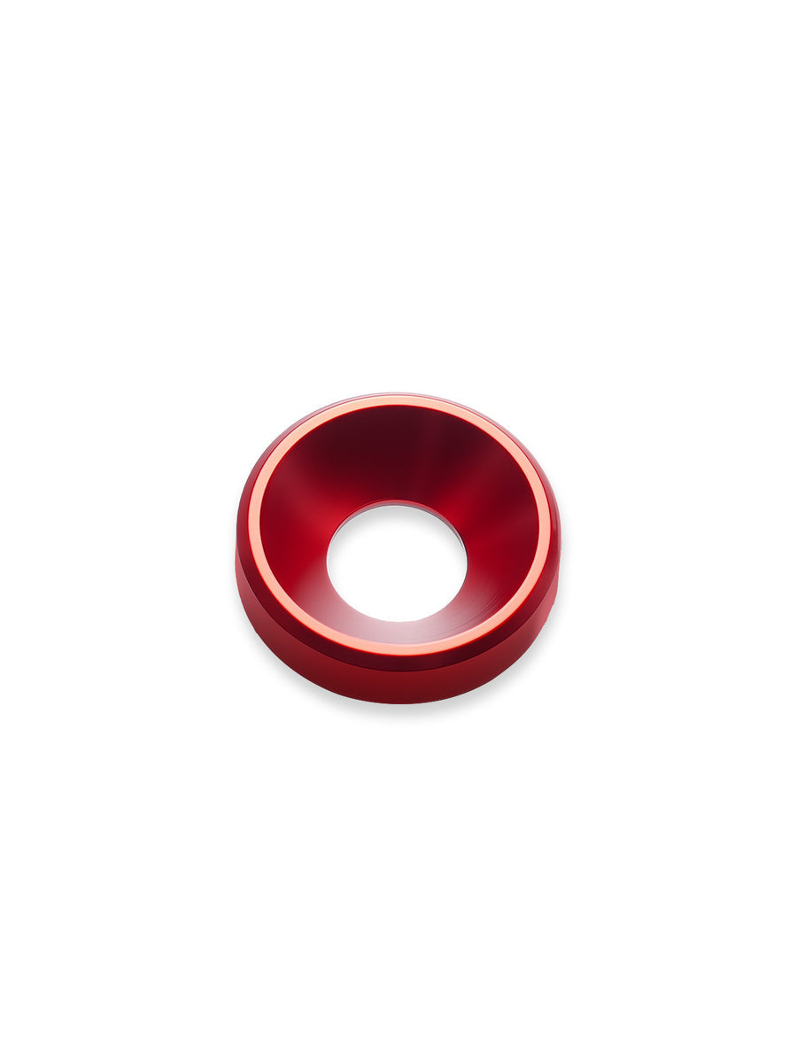 Red anodized aluminum countersunk washer for EDC gear customization and knife sheath upgrades.