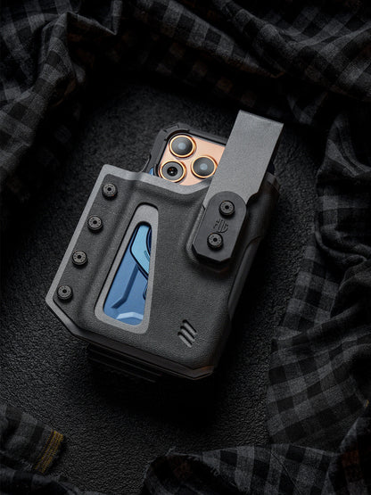 Front view of the black Single Skeleton Window phone case with belt clip, holding a smartphone on a dark plaid fabric background.