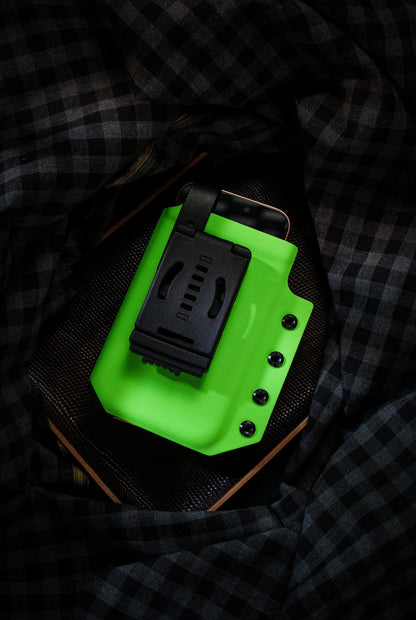 Rear view of the neon green Skeleton Frame phone case, highlighting the black belt clip and backside structure.