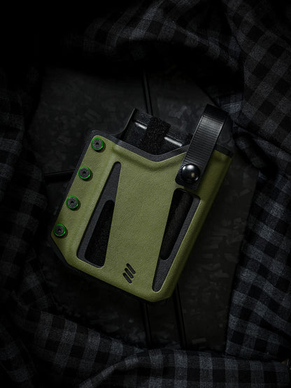 Front view of the empty olive green Skeleton Frame phone case, showing the cutout frame design and adjustable retention strap.
