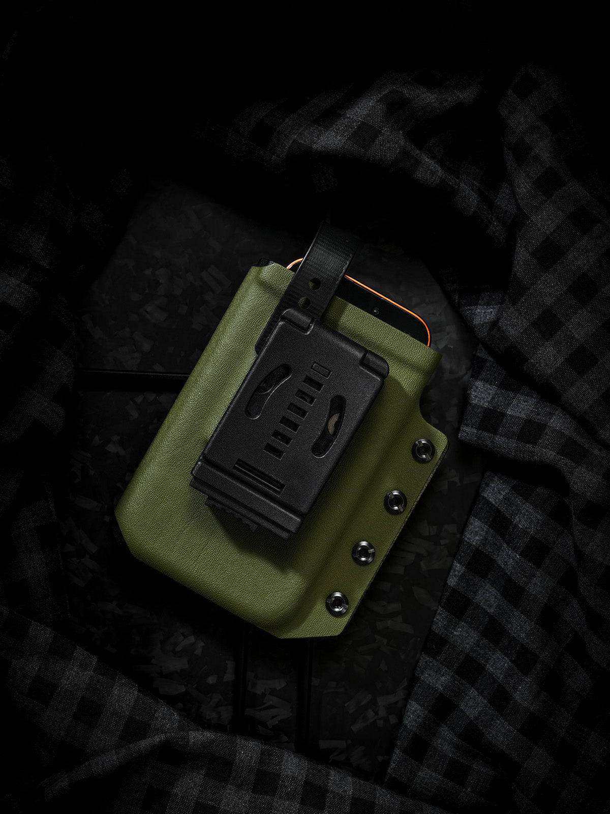 Detailed rear view of the olive green Skeleton Frame phone case, showing the black belt clip and rear mounting hardware.