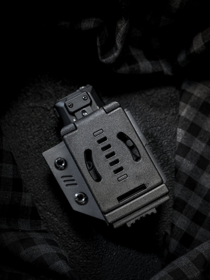Back view of the TACTICALGEEK TG TX13 KYDEX flashlight sheath with belt clip for NITECORE EDC37