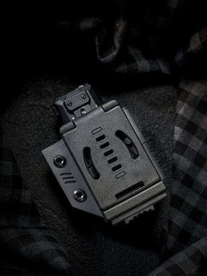 Back view of the TACTICALGEEK TG TX13 KYDEX flashlight sheath with belt clip for NITECORE EDC37