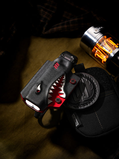 Shark-style TX10 flashlight sheath for Nitecore EDC29 with bicycle clamp, displayed on a tactical pouch.