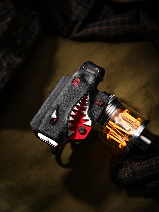 Shark-style TX10 flashlight sheath for Nitecore EDC29 with bicycle clamp, displayed beside a glowing lantern.