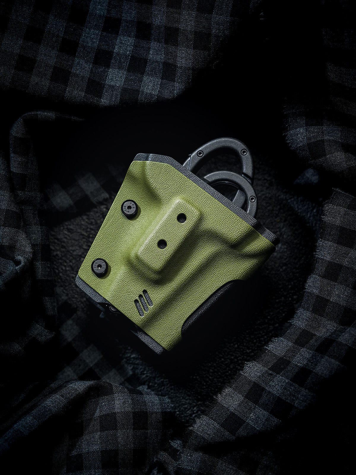 Front view of the TACTICALGEEK TX18 Multi-Tool Sheath for SOG ParaShears in green colorway, showing the molded front panel and exposed ParaShears handles.