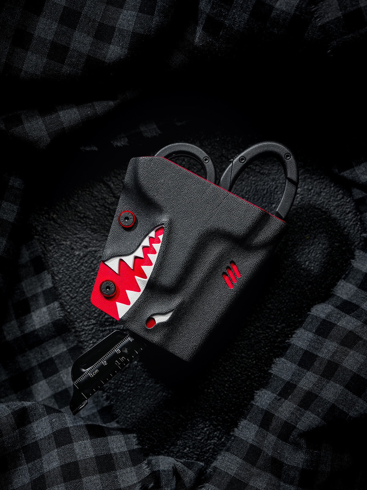 TACTICALGEEK TX18 Multi-Tool Sheath for SOG ParaShears in shark colorway with the ruler tool extended from the ParaShears.