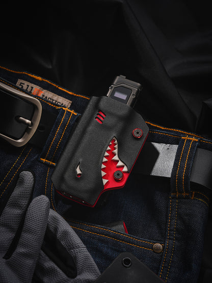 TACTICALGEEK TX9 flashlight sheath for Nitecore EDC27 shown in a belt carry flat lay with jeans and gloves.