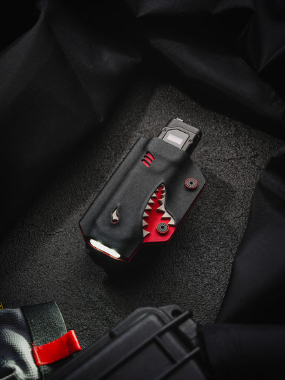 TACTICALGEEK TX9 flashlight sheath for Nitecore EDC27 with illuminated front view on a dark textured surface.