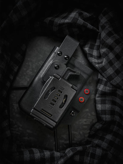Rear view of the black and red TACTICALGEEK TG EDC KYDEX shark phone sheath showing the belt clip attachment and back structure.