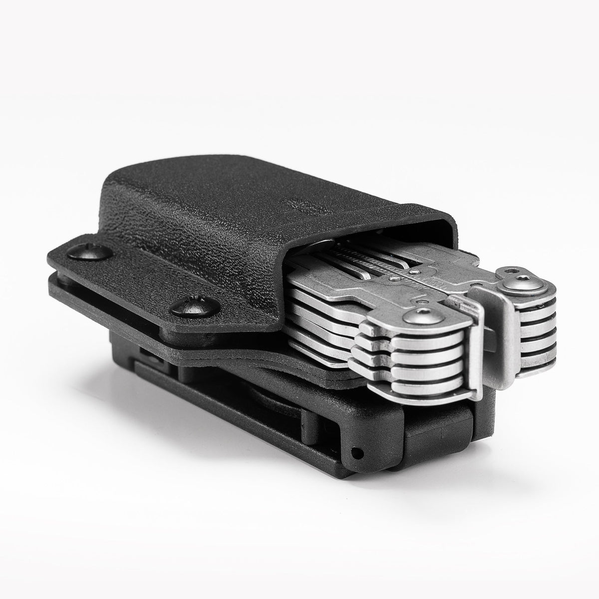 Angled product view of the black TX3 Multitool Sheath holding a multitool in a horizontal carry position.