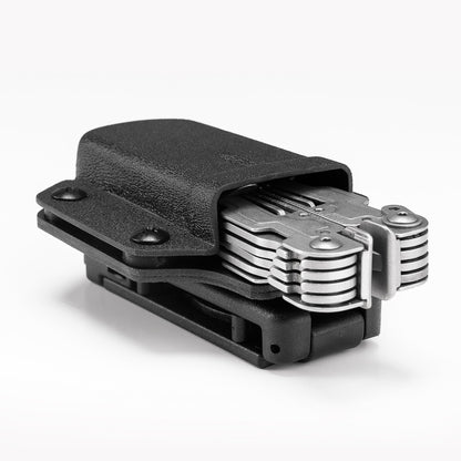 Angled product view of the black TX3 Multitool Sheath holding a multitool in a horizontal carry position.